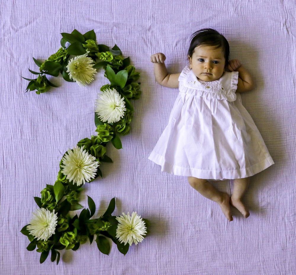 2 Month Old Baby Girl With Flowers