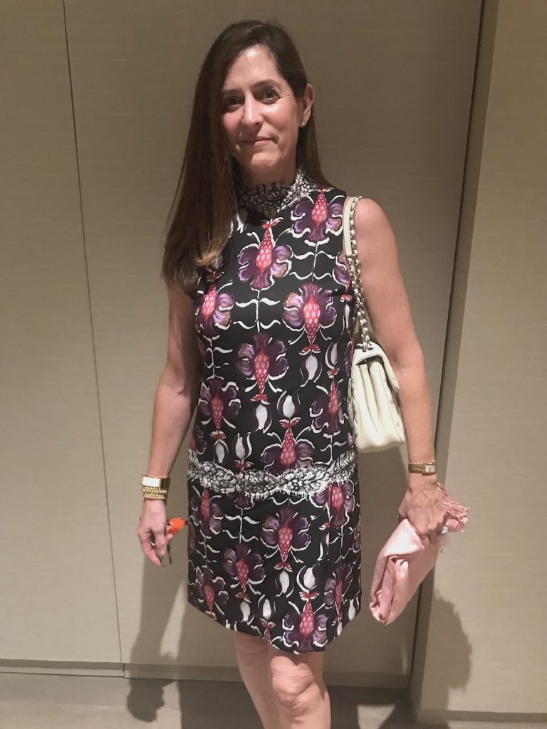 Woman In Orchid Pattern Floral Dress
