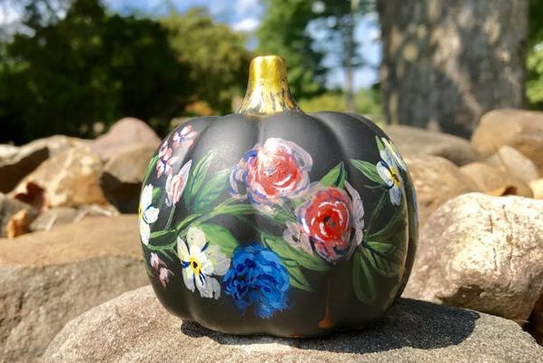 Flowers painted on a pumpkin