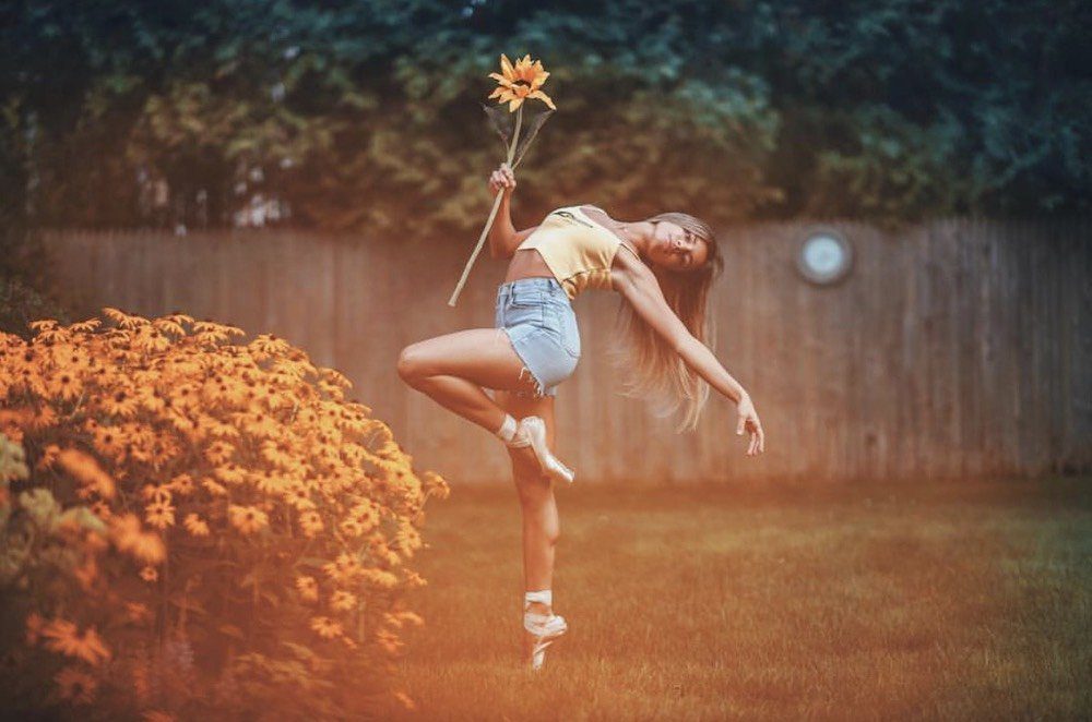 Ballet Dancer Isabella Fonte Holding Flower