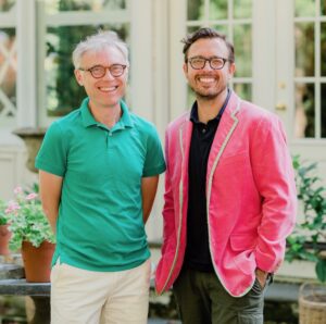 A man wearing a pink jacket.